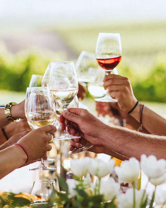 Glasses of White Wine Cheersing